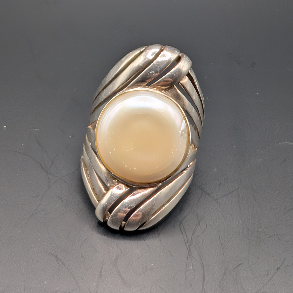 The moon, with comets streaking by