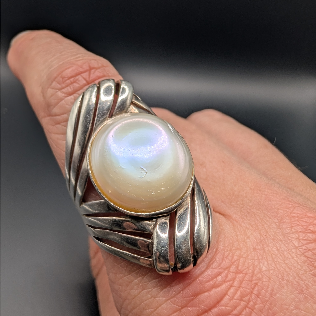 The moon, with comets streaking by