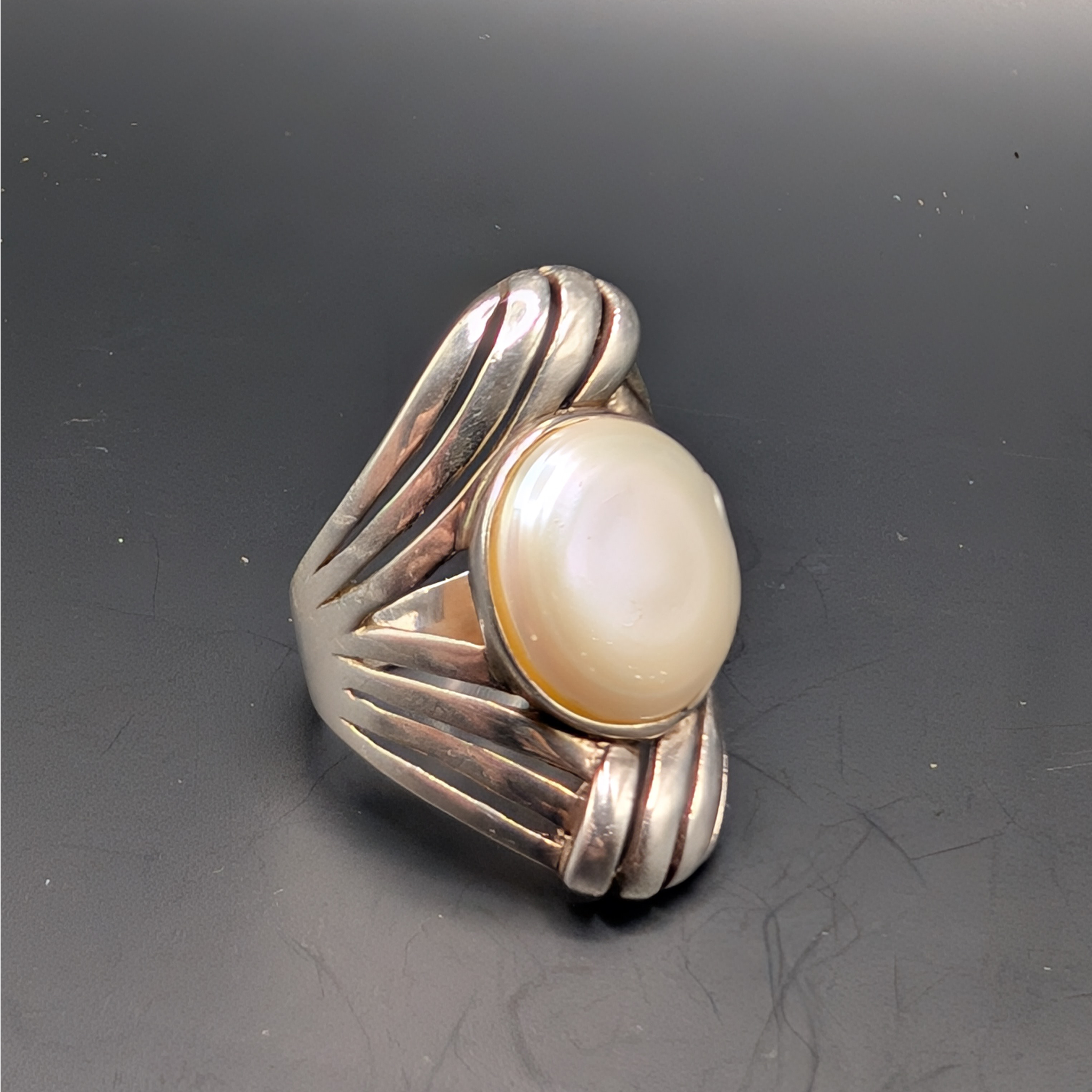 The moon, with comets streaking by